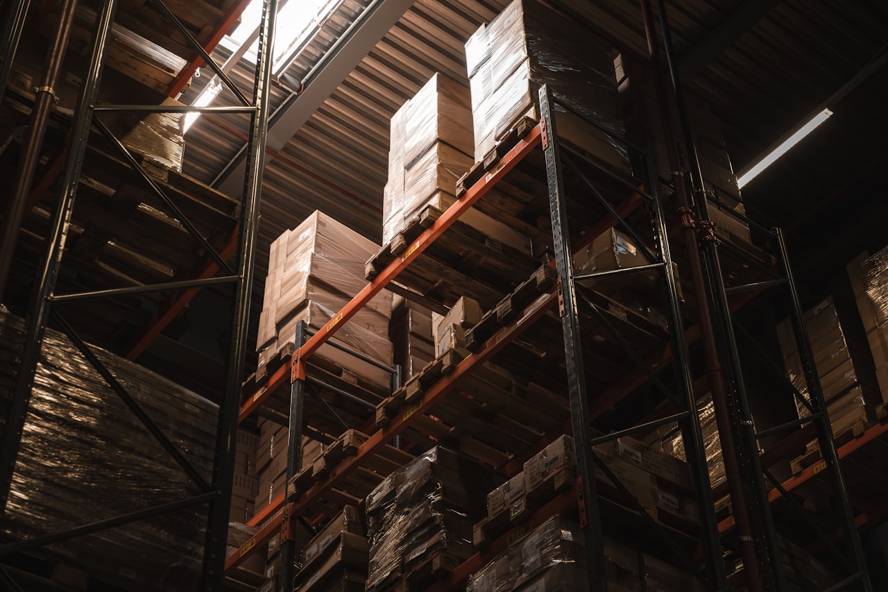 WMS cloud dashboard showing real-time inventory levels and fulfillment status across Shopify, Amazon, and Faire channels